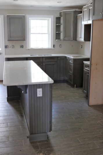 Unit 2 Gray kitchen with antique wash